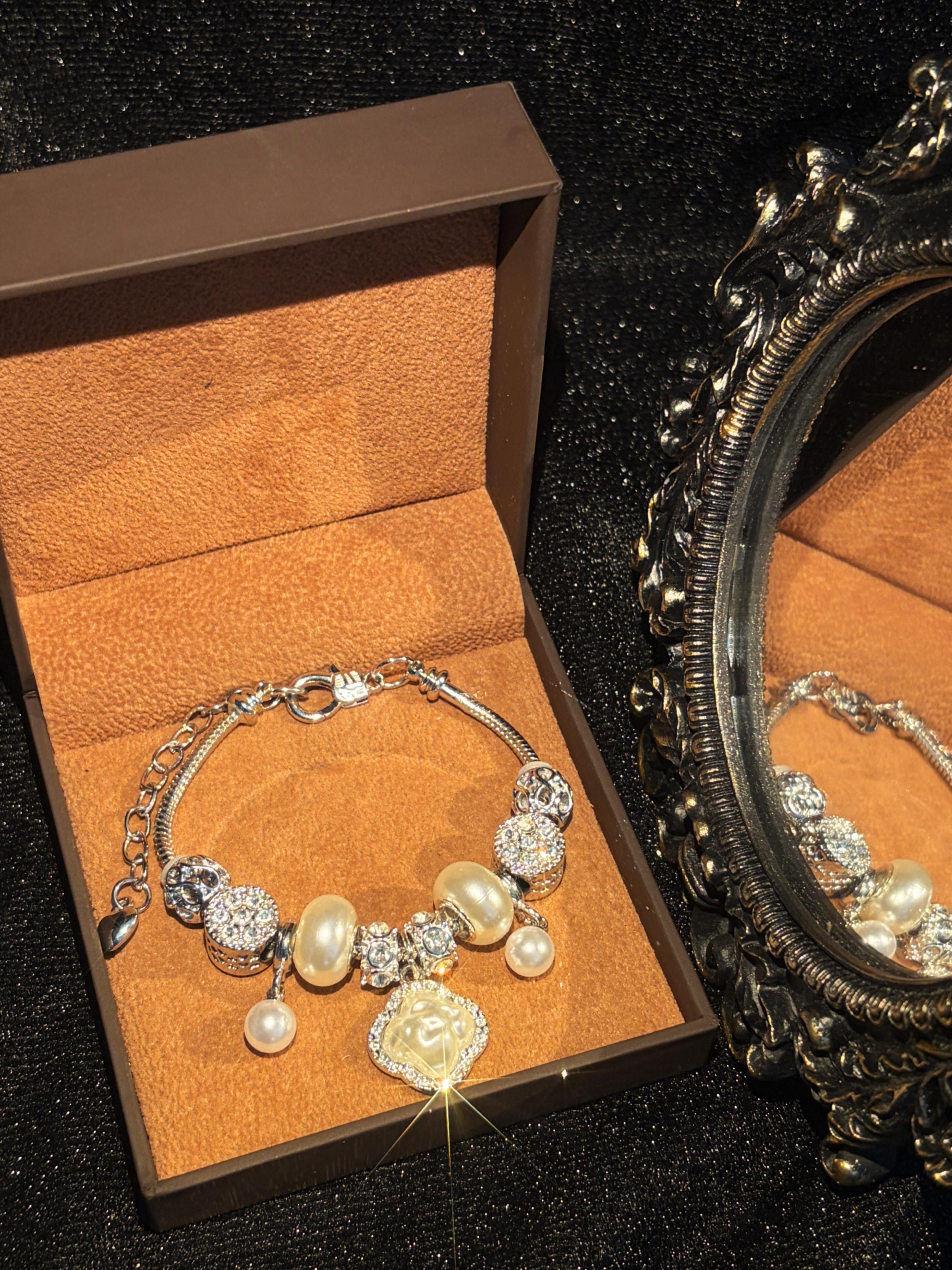 Silver-Tone Snake Chain Charm Bracelet - Clover Embossed Pendant, Pearl & Rhinestone Inlaid Stackable Costume Jewelry Gift for Women Silver-Tone Snake Chain Charm Bracelet - Clover Embossed Pendant, Pearl & Rhinestone Inlaid Stackable Costume Jewelry Gift for Women