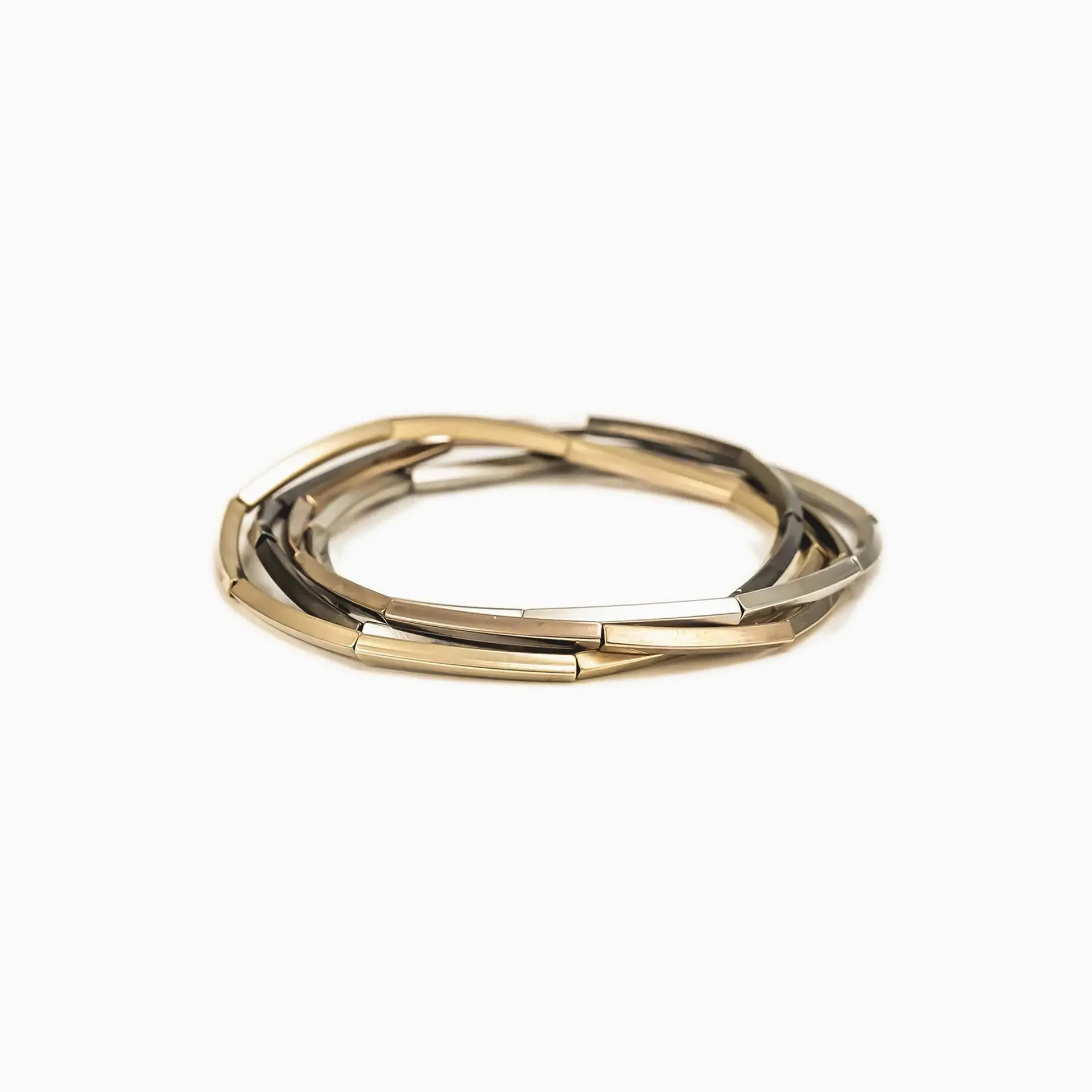 Unisex Piper Stretch Bracelet - Lightweight Brass with Polyurethane Coating - Gold, Silver, Bronze, and Dark Grey Mix