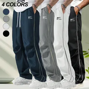 Men’s straight-leg athletic pants with side stripes—drapes well, slimming and versatile. Available in four colors; contrasting side lines add a trendy touch. Elastic waistband with drawstring adjustment for comfort. Suitable for everyday commuting and cas