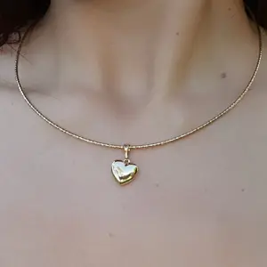 Gold Heart Pendant Necklace - Simple Design with Gold Finish, Adjustable Chain, Ideal for Everyday Wear