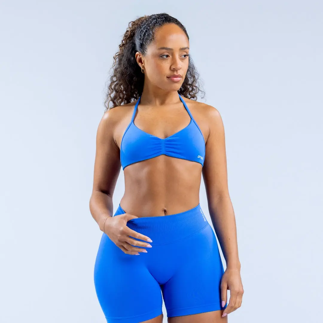 DFYNE Impact Strappy Bra & Shorts Set - Sleek Coral Activewear for Women, High-Waist, Supportive & Breathable, Ideal for Belly Workouts Solid Color Sportswear