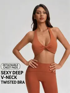 Sexy deep V halter bra with twist knot, breathable backless design, push-up sports bra for Pilates and yoga