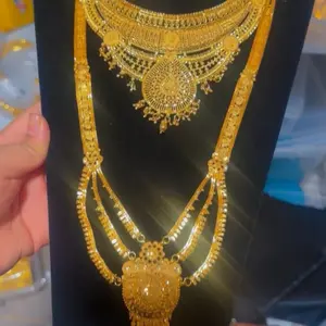 Gold Plated Bridal Necklace Set with Intricate Design and Elegant Tassel Detail for Special Occasions