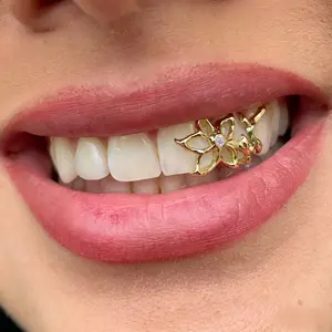 Personalized and fashionable braces, double gold teeth with hollow flower design, cool tooth decorations ornaments for Halloween
