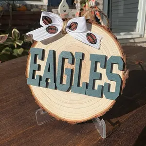 EAGLES 4in Round Wood Holiday Ornament with Football Bow and Clear Stand for Festive Decor