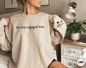 Personalized In My Engaged Era Shirt, Custom Bride T Shirts, Engagement Gift For Her, Newly Engaged Gift, Fiance Sweatshirt, Future Mrs With Name On Sleeve Shirt, Bride Era Shirt, Bachelorette Party Shirts, Just Engaged Tshirts, Bride To Be Gift WM1Y1_H12