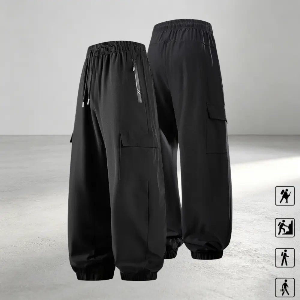 Cuffed cargo casual pants with multiple pockets, American functional street style, elastic waistband with drawstring and side zipper pockets, suitable for outdoor activities and city walks, solid color design that pairs well with various casual tops.