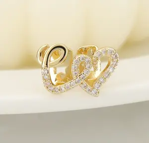 Stylish double heart tooth grills made of copper with micro inlaid zircon. Trendy hip-hop teeth decorations with exquisite sparkling details. Unique personalized design, comfortable to wear,perfect for parties, performances and daily street fashion looks.