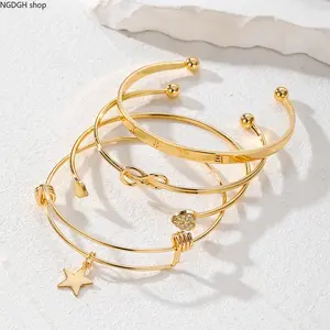 Gold Stackable Bangle Bracelets for Women - Trendy Star Heart Infinity Charm Cuff Set, Shiny Waterproof Stainless Steel Layering Bangles, Perfect for Daily Stacking Party Date Night & Elegant Wrist Looks