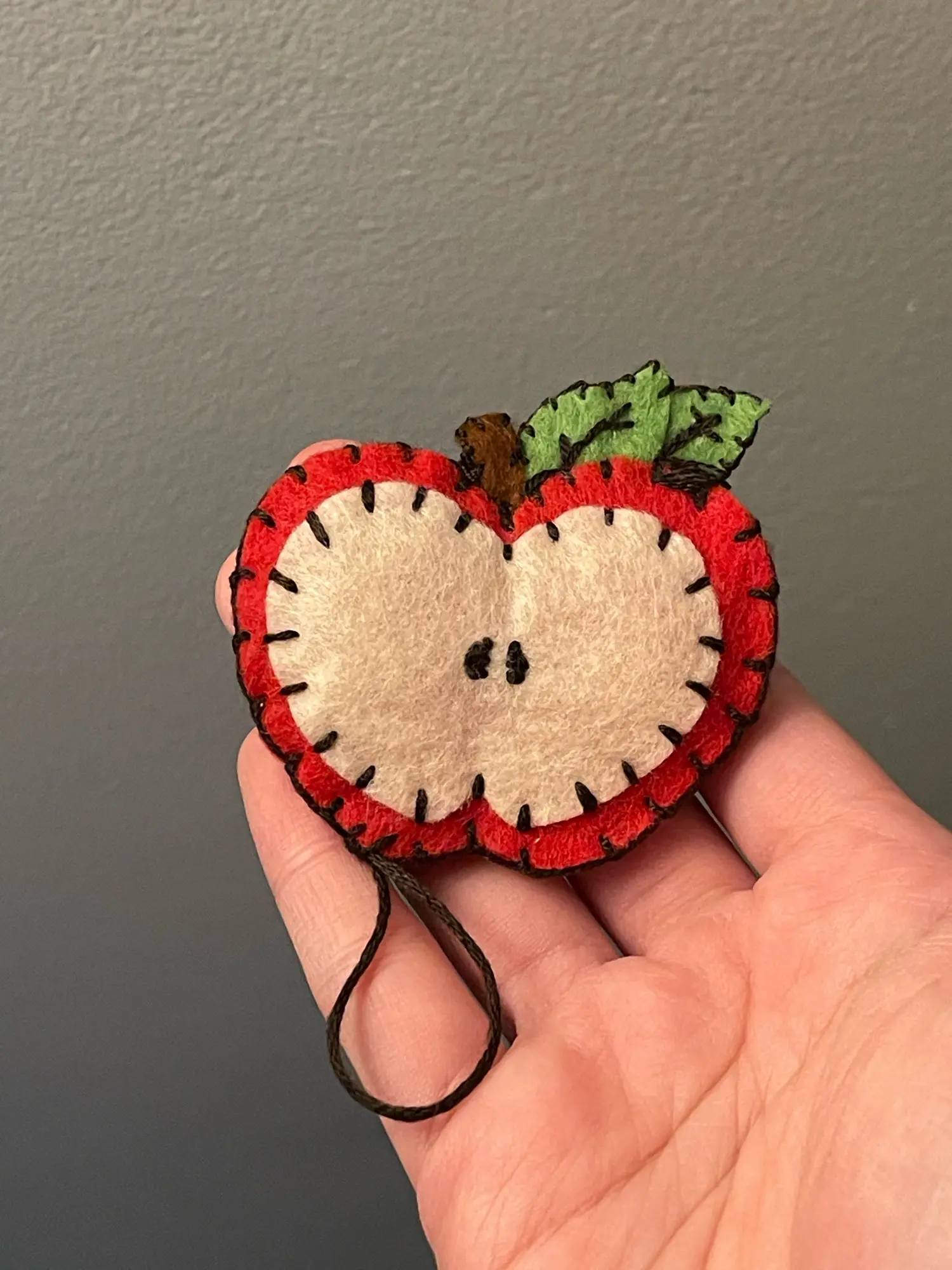 Handmade felt apple wired earbud holderr