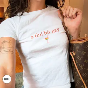 [Sale Up To 40%] Subtle Lesbian Baby Tee, A Tini Bit Gay Sapphic Shirt, WLW Gift Ideas, Femme Pride Month Girlfriend Tee Queer Fashion, Bisexual BabyTee Subtle Lesbian