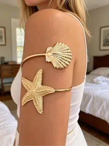 Adjustable open-style bracelet, ring, and arm cuff with sea star and fan-shaped shell design. This casual all-season accessory is the perfect gift for men and women, ideal for Christmas, Halloween, summer, winter, Valentine's Day, and New Year. It is an e