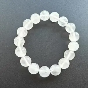 White Phantom Quartz Bracelet. Promotes spiritual growth, purifies energy, fosters tolerance and compassion, attracts luck and wisdom, provides purification and balance. Suitable for a wide range of individuals. Consecrated by a Taoist master.