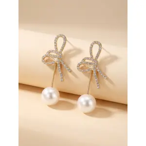 Sparkling Bow & Pearl Drop Earrings – Holiday Gift Delight