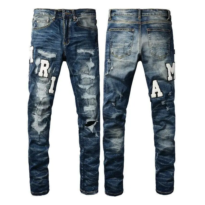 Men’s trendy slim-fit jeans from European and American high street fashion, featuring embroidered lettering, ripped patches, and stretch fabric Men’s trendy slim-fit jeans from European and American high street fashion, featuring embroidered lettering, ripped patches, and stretch fabric