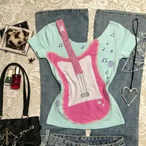 Aesthetic Harajuku Y2K Collection | Cyber Grunge Anime Graphic Tees, Vintage Guitar Print Patchwork Tops, Indie Punk Lace Ruffle Camis, Retro Aesthetic Streetwear Outfits