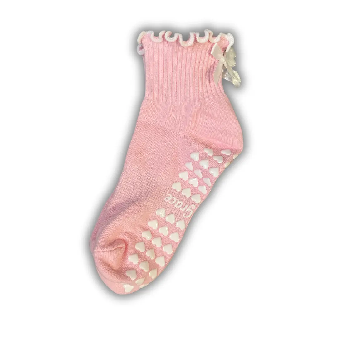 Ballet pink ruffle grip socks with white bow and white heart grips