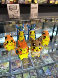 (Poncho Pikachus) Pokémon 3D Printed Figurines Featuring Various Pokémon Characters for Collectors and Fans Featuring Pikachu as Gyrados, Dragonite, Charizard, Eevee