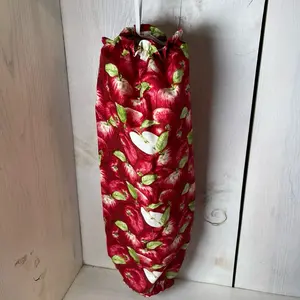 Apple print plastic bag holder