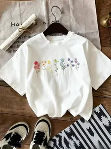 Retro Rainbow Wildflower Botanical Graphic T-Shirt, Vintage Boho Colorful Floral Print Oversized Crew Neck Tee, Women's Short Sleeve Streetwear Cotton, Trendy Cottagecore Aesthetic Shirt for Plant Lovers, Nature Enthusiasts and Casual Outfit Fans