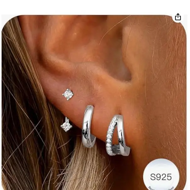 Steel colored ear buckles, two wearing,