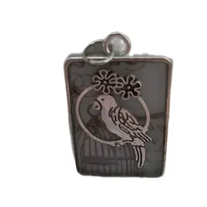 Singing bird pendant.