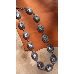 THE CONCH HIDE CHAIN BELT