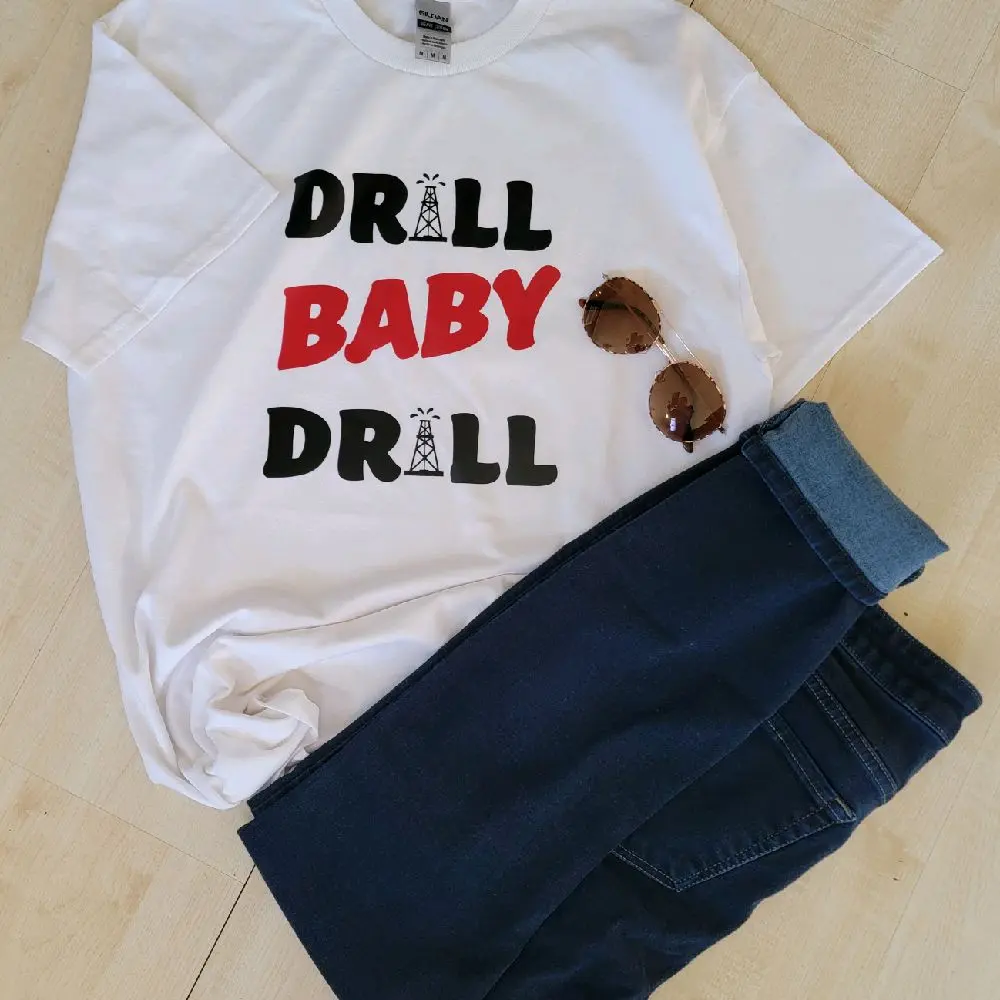 Drill Oil T-Shirts - Women's & men's Casual Top with "DRILL BABY DRILL" Graphic in White and Black - Womenswear Menswear