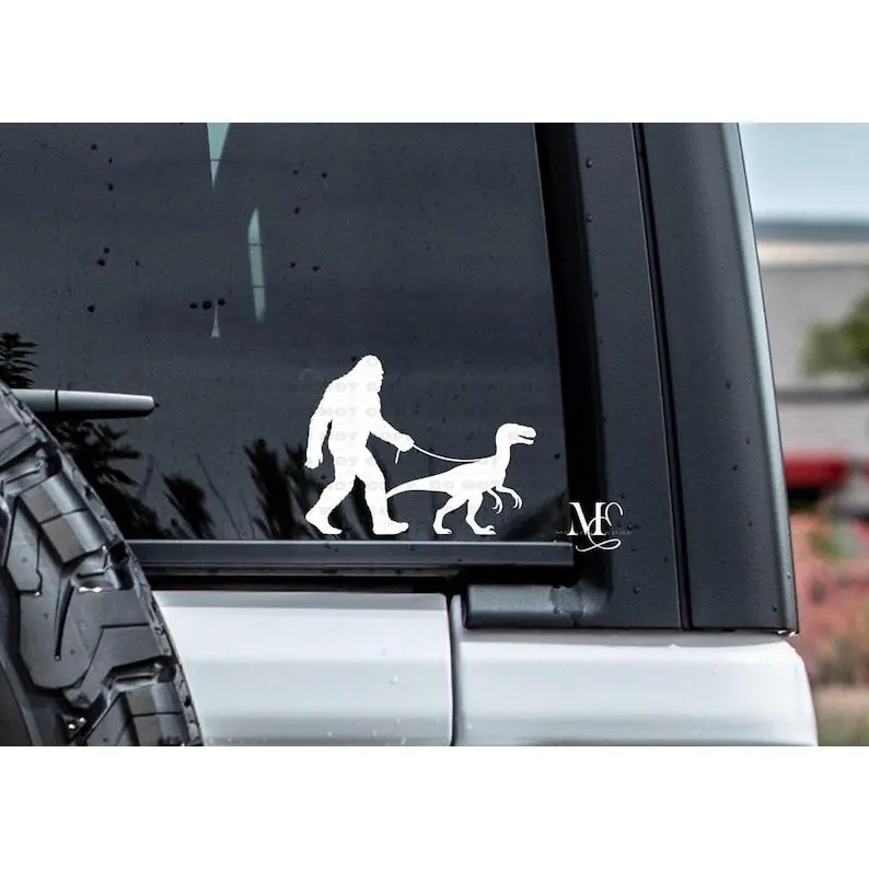 Bigfoot Walking A Velociraptor Vinyl Car Decal