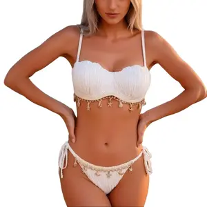 Boho Shell & Starfish Bikini Set – White ribbed two-piece swimsuit with adjustable side tie; summer beachwear white ribbed bikini with gold seashell charms – women’s bohemian swimwear featuring a back-tie top and high-cut bottoms
