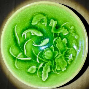 Lotus pond fish swimming green ice cracked tea cup