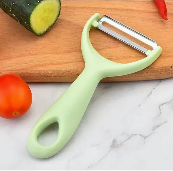 Y-shaped fruit peeler with sharp stainless steel blade, quickly peel cucumbers, potatoes and fruits. Lightweight non-slip handle with hanging hole for convenient kitchen storage.