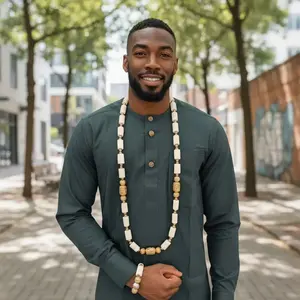 Esinam Ivory African Beads Necklace and Bracelet Set with Gold Ornaments DPILIGLNB | Dupsie’s African Fashion Jewelry