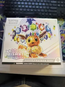 Pokemon Prismatic Evolutions Elite Trainer Box