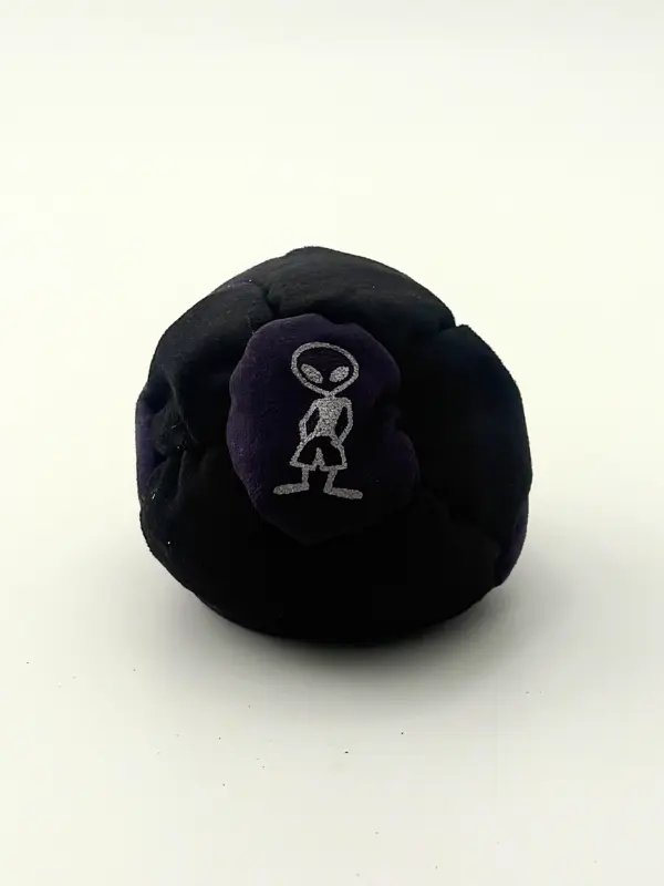 Andromeda Sand-Weight Hacky Sack - Black Body with Deep-Purple Alien Patch, Hand-Built 45g Footbag for Stalls & Trick Work, Minimal Bounce, Lands Flat, Andromeda Colorway