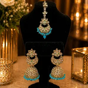 Gold plated Kundan tikka and Jhumka earring set