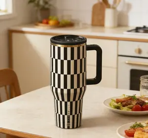 Hydrojug   black tie 40oz Stainless Water Bottles ! A portable, insulated tumbler complete with a straw, featuring a leak-proof design and a non-slip rubber base. An ideal choice for dates, school, sports, travel, and outdoor adventures.