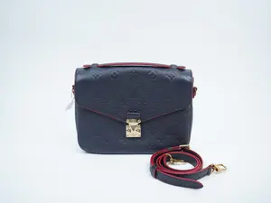 Pre-owned Louis Vuitton calfskin Crossbody Bags Empreinte Pochette Metis Marine Rouge