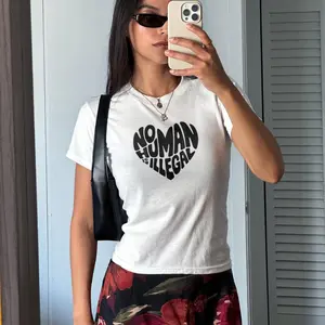 No Human Is Illegal - Heartfelt Keep The Immigrant Social Justice T-Shirt for Advocacy