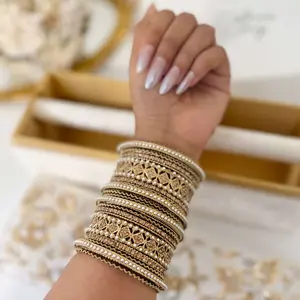 Gold Bangle Set with Pearls designed to add grace and sophistication,