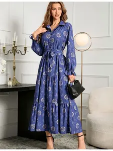 A women's blue-based floral print polo-collar long-sleeve tie bow waist-cinching slimming maxi dress, suitable for daily wear, commuting and vacation outfits.