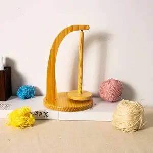 A storage case for yarn used for weaving and knitting, suitable as a gift for knitting enthusiasts. Knitting yarn storage case made of wood (bamboo color) for knitting.