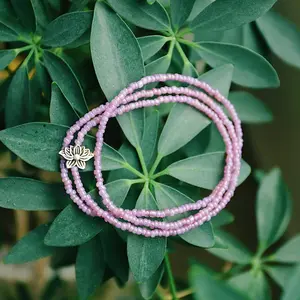Purple seed beaded lotus flower wrap bracelet