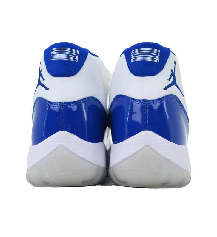 Classic UNC white royal blue glossy leather mid top retro basketball sneakers with blue embroidery jumpman heel! Transparent ice blue outsole for spring campus & half-court fits #UNCSneakers #Retr