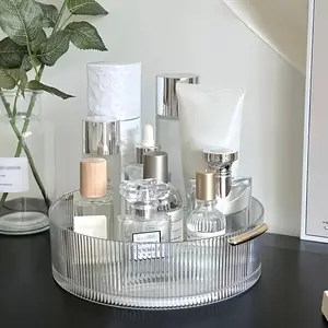 1 transparent cosmetics and jewelry storage tray with handle - 360 ° rotation for perfumes, brushes, nail polish - Home, salon, bathroom, desktop space saving design - Durable plastic material, smooth rotation Professional grade construction