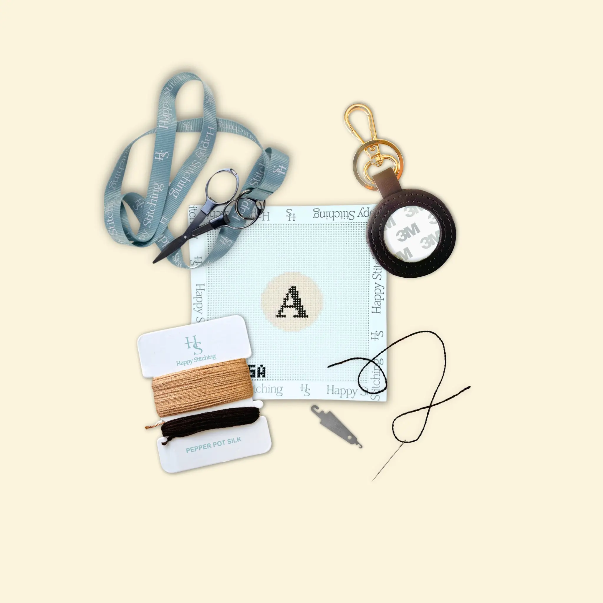 Our Initial Thought Brown Key Fob Needlepoint Kit - Happy Stitching All-in-One, Self-Finish Needlepoint Kit