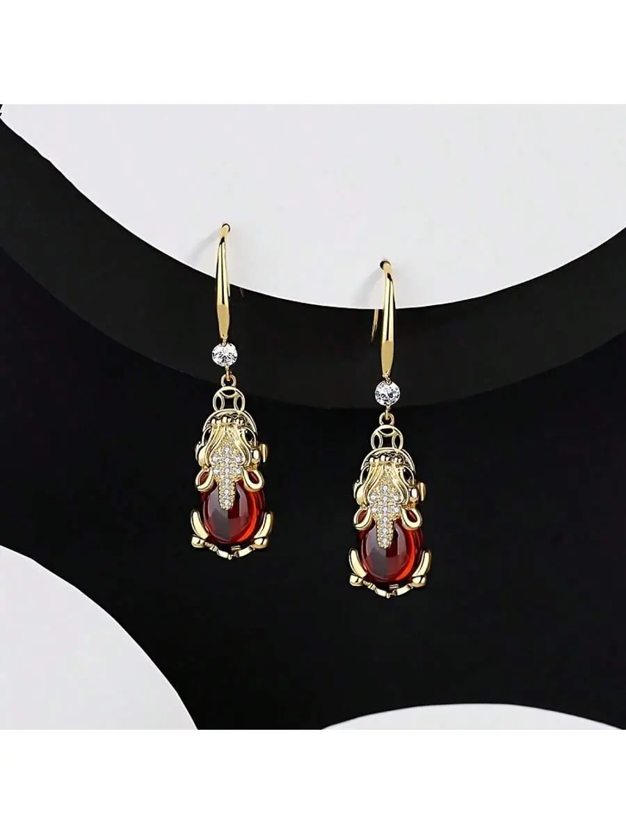 A pair of red teardrop gemstones and rhinestones embellished earrings | Suitable for daily wear and Valentine's Day gifts, Valentine's Day jewelry | Traditional pattern earrings | Teardrop shaped gemstone earrings