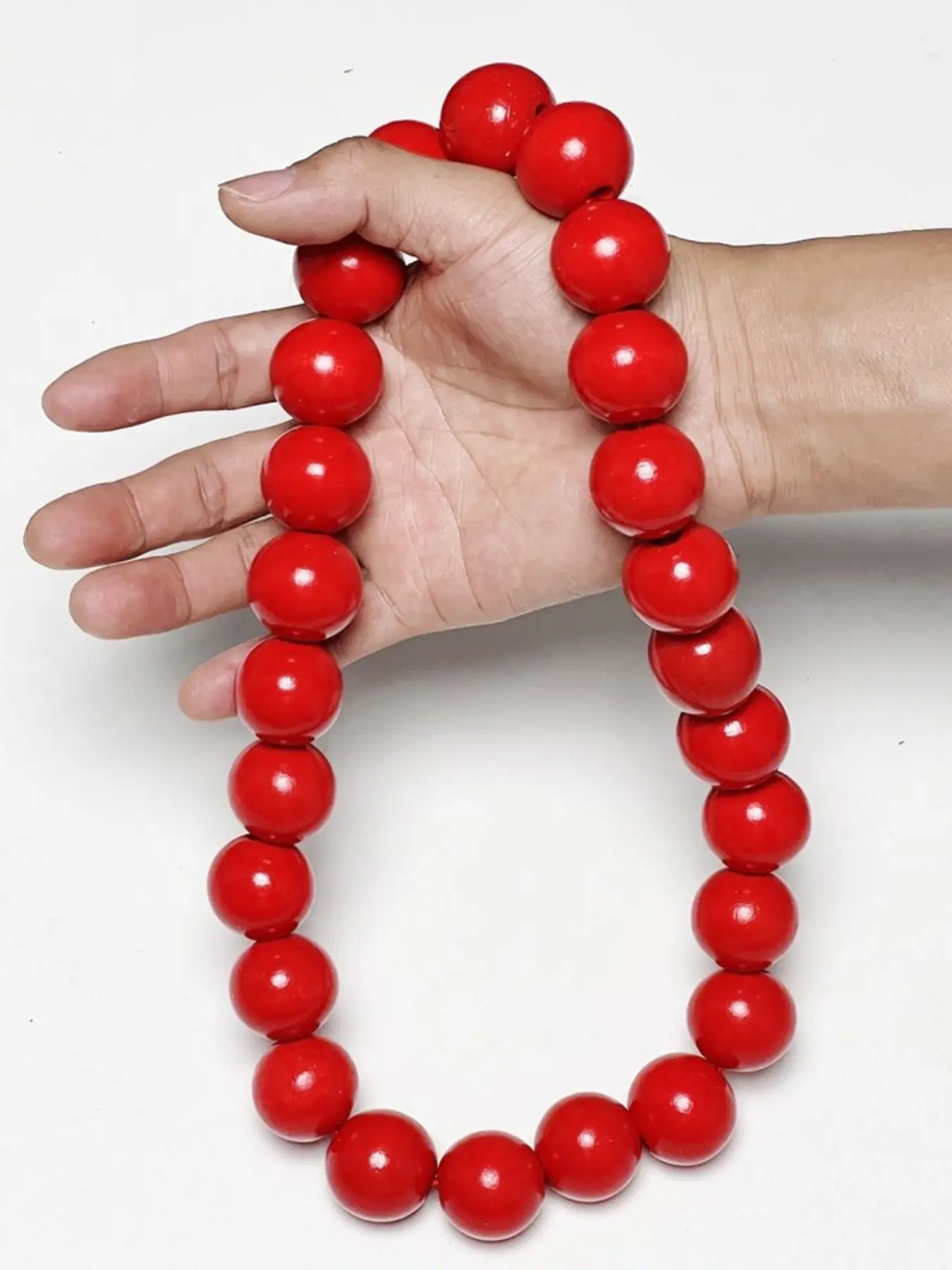 Large red bead necklace, Adjustable beaded design, hand strung with elastic rope, approximately 23 inches in length. The rope has elasticity and can be adjusted. The bead diameter is about 1 inch, suitable for daily wear, shows, costume parties