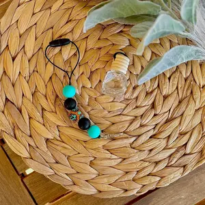 Teal and brown Aztec freshie/diffuser car hanger
