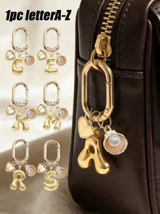 Gold bubble letters A-Z keychain for women, cute initial letter pendant, with heart and ocean pearl shell charms, shiny metal letter key ring, personalized bag charm, for handbags and backpacks